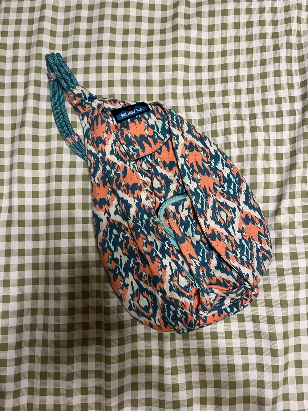 Kavu Sling Bag in Coral and Teal Ikat